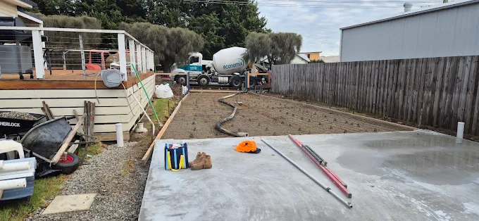 Concrete slab pour with cement truck on site